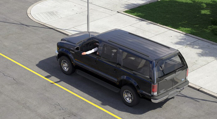 **This driver is using a hand signal. The driver intends to**