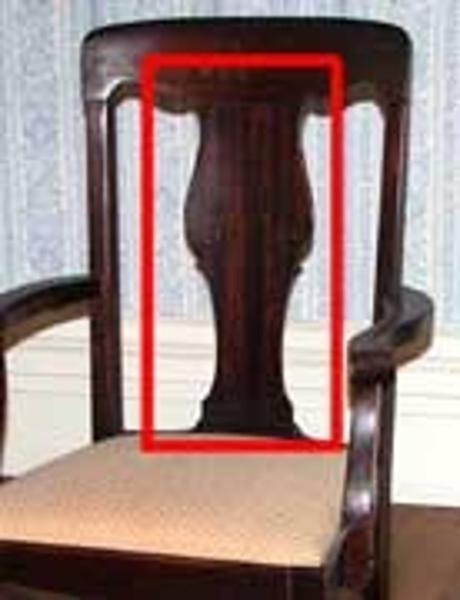 <p>A slat of wood in the middle of a chair back</p>