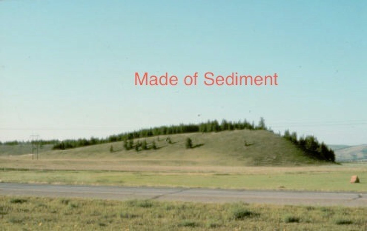 <p>a long ramp shaped mound of till that is smoothed in the direction of the glacier's flow</p>