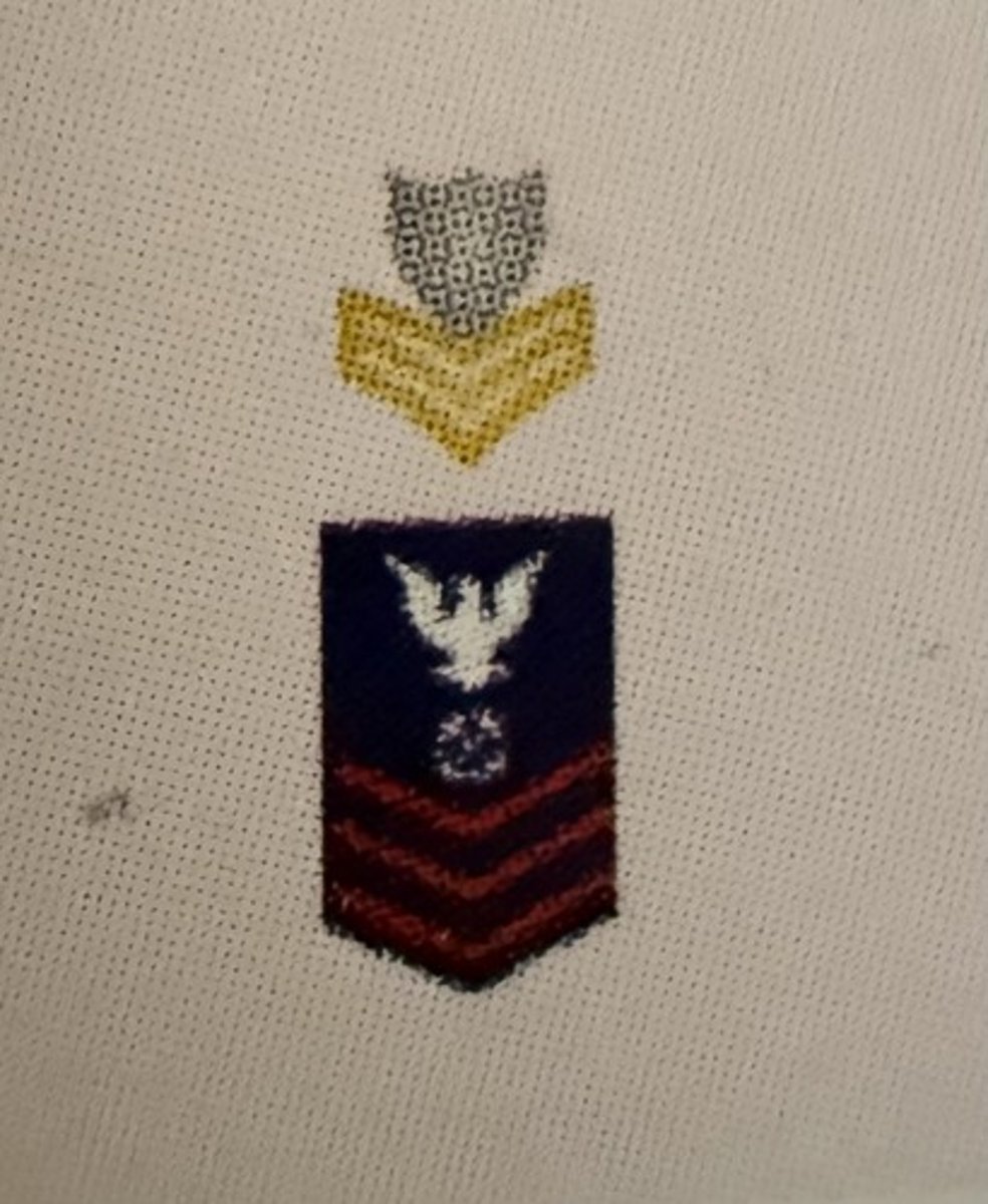 <p></p><ul><li><p><strong>Collar Device:</strong> Zero Three Gold Chevrons</p></li><li><p><strong>Sleeve Insignia:</strong> Zero Three Red Chevrons</p></li></ul><p></p>