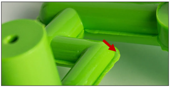 <p>thin, excess plastic that escapes the mold cavity at the parting lines</p>