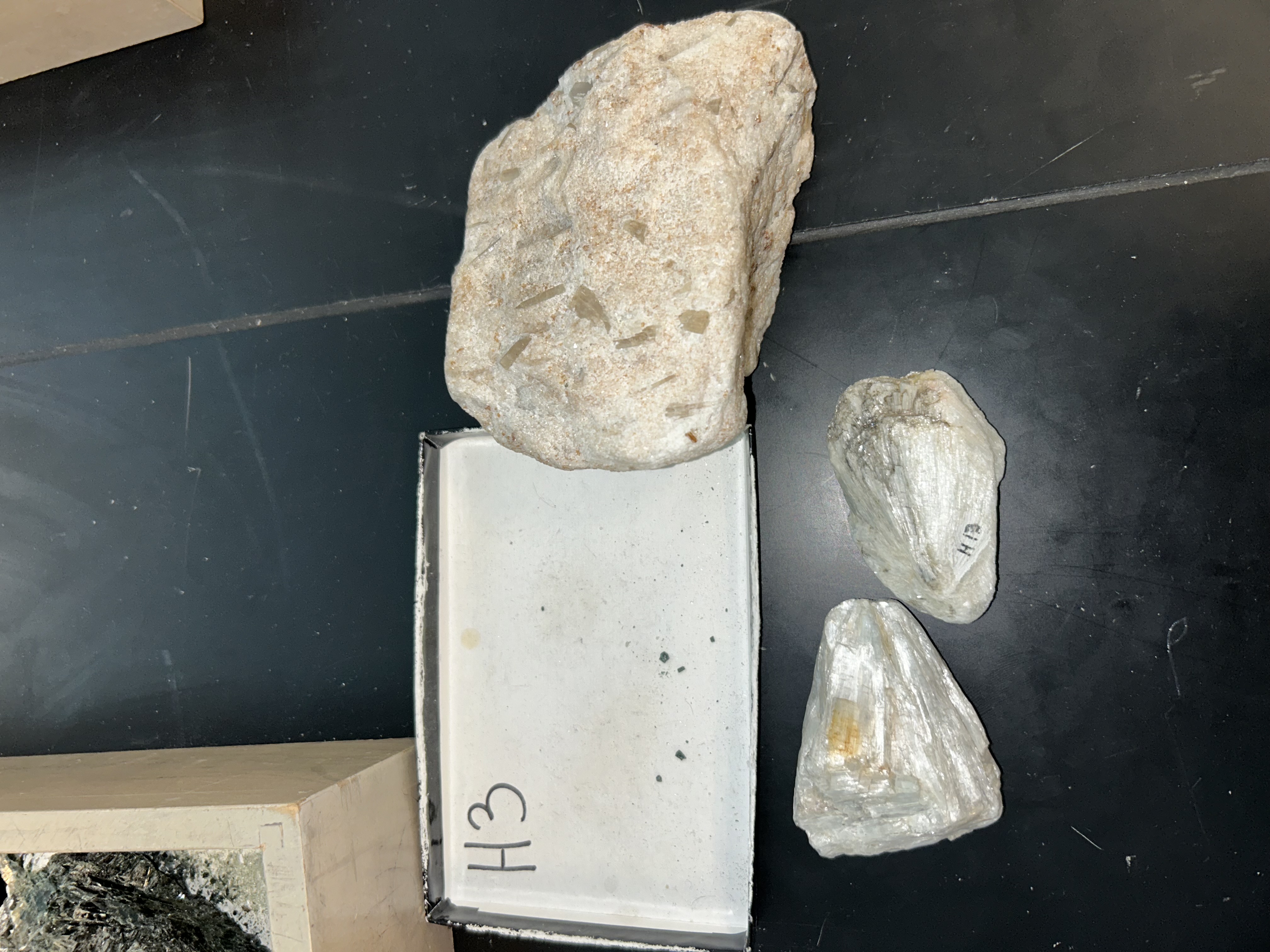 <p>colorless/white</p><p>fibrous- needle-like crystals</p><p>splintery</p><p>can scratch glass</p>