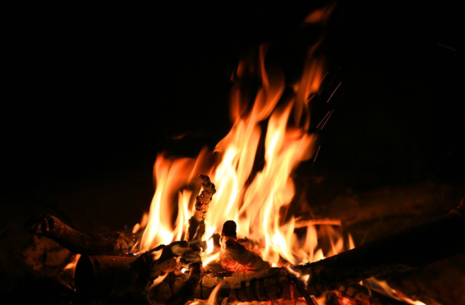a chemical reaction which involves oxygen reacting with substances to form oxides and give off heat, CO2 and water are always products