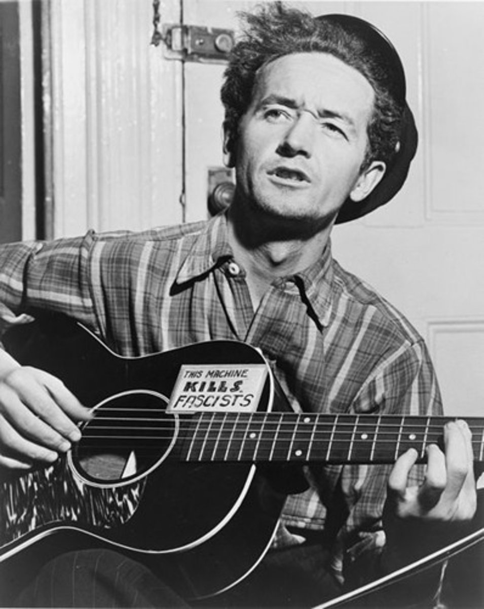 <p>American songwriter and folksinger who flourished in the 1930s, writing songs about social injustice and the hardships of the Great Depression years- two of his best-remembered songs are "This Land is Your Land" and "So Long, It's Been Good to Know Yuh."</p>