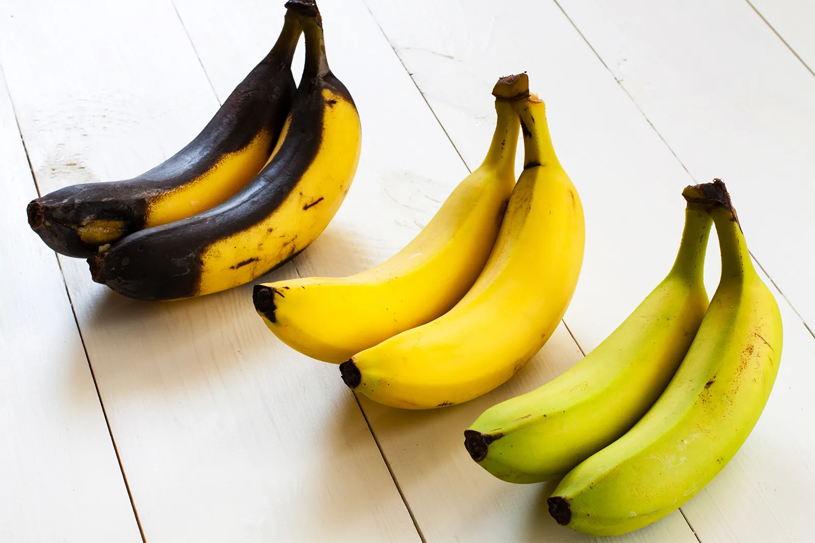 <p>Ethylene is a gaseous plant hormone that accelerates the ripening of fruits;</p><p>Fruit ripening is a positive feedback loop, so once a fruit starts producing ethylene gas, this signals to the fruits to initiate ripening; <br><br>Then, Ethylene gas starts to spread to nearby fruits, which start producing their own Ethylene in response, and more and more Ethylene keeps being produced, to make sure that all of the fruits ripen together.</p>