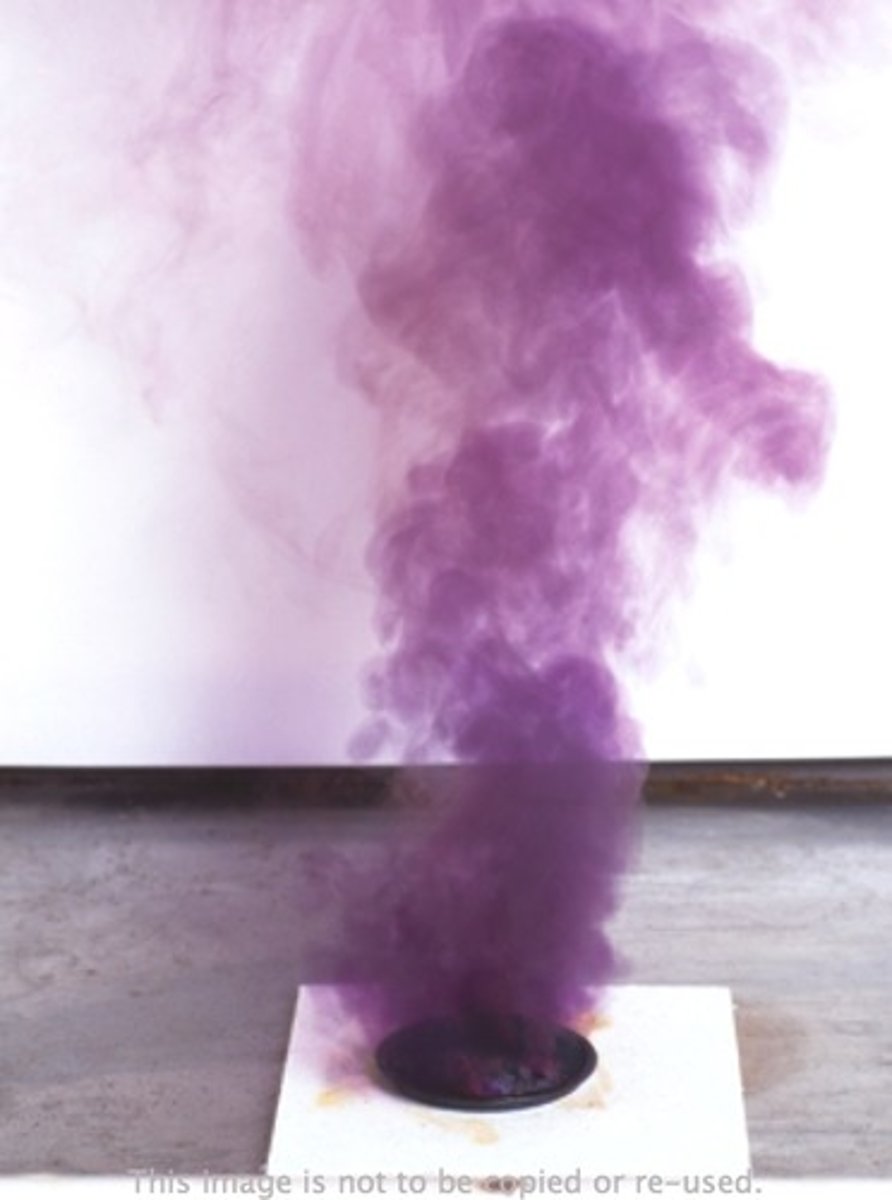 <p>A dark grey crystalline solid or purple vapour</p>