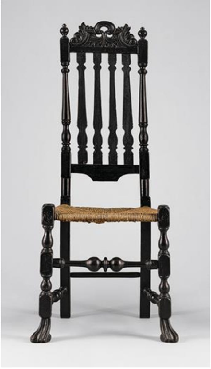 <p>Generally made of maple and often ebonized. Features vertical split banisters in the back. Widely used in rural America in the 1700's.</p>
