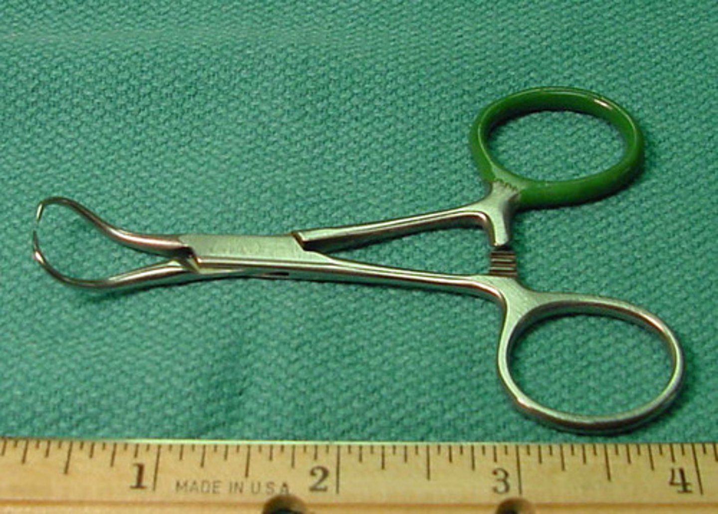 <p>used for grasping and holding, ratcheted instrument with curved, sharp, tinelike jaws.</p>