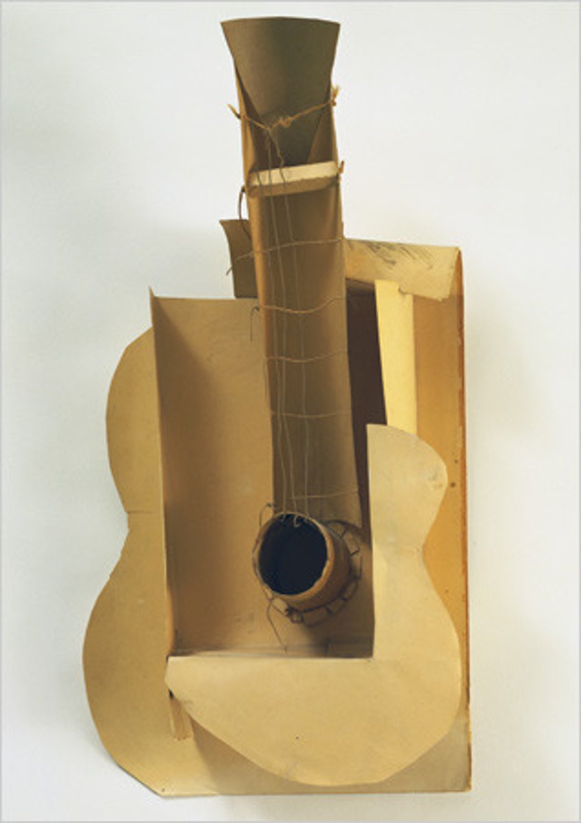 <p>Picasso's Cubist artwork, 'Guitar' from 1912, influenced Tatlin's early material-based sculptures.</p>