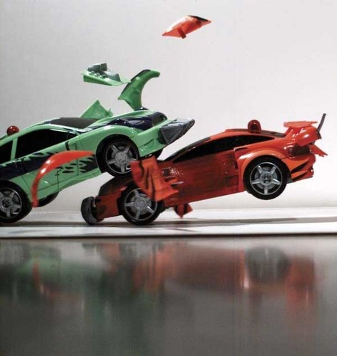 <p>A- investigate whether the use of leading questions, specifically the verb used to describe a car crash, would influence participants’ estimation of the speed of the vehicles.</p><p>M-</p><p>Design: Independent samples design.</p><p>Participants: 45 students divided into five groups of 9.</p><p>Procedure: Each participant watched 7 traffic accident clips (5–30 seconds long). After each film, they gave an account and answered a questionnaire. One key question asked them to estimate the speed of the cars using different verbs: smashed, collided, bumped, hit, or contacted.</p><p>R-</p><p>The verb influenced the estimated speed:</p><p>Smashed: 40.8 mph</p><p>Collided: 39.3 mph</p><p>Bumped: 38.1 mph</p><p>Hit: 34.0 mph</p><p>Contacted: 31.8 mph</p><p>Results were statistically significant (p ≤ 0.005), showing that the intensity of the verb affected perception.</p><p>C- Leading questions can distort memory. The verb used may cause a response bias or actually alter the memory through schema activation (e.g., “smashed” suggests a more severe crash, influencing reconstruction). This supports Bartlett’s theory of reconstructive memory</p><p>Evaluation:</p><p>-conducted in a lab, which may reduce ecological validity; real-life memory often involves stronger emotions than watching staged videos.</p><p>-accident films were made for educational purposes, so participants likely didn’t experience the emotional impact of a real crash.</p><p>-high control over confounding variables, allowing cause-and-effect conclusions between verb intensity and speed estimates.</p><p>-use of students as participants is a limitation—they may not represent the general population in age, experience, or driving skill.</p><p>-many students were likely inexperienced drivers, which could have influenced their ability to accurately estimate speed.</p><p>-estimating speed is difficult for most people, not just students, so this limitation may apply more broadly.</p>