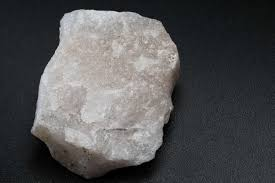 <p>Metamorphic, mostly crystals, scratches glass and no reaction to HCl</p>