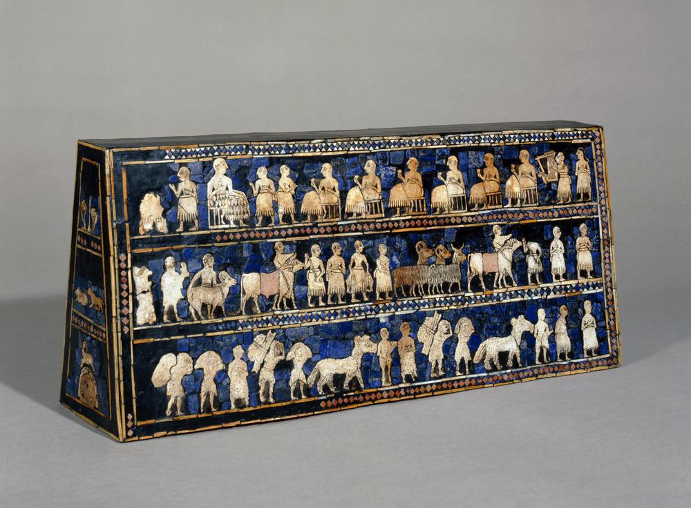 Piece that depicts a pictorial narrative with one side being a battle and another side being a feast. Uses hierarchy of scale and made with lapis lazuli. 