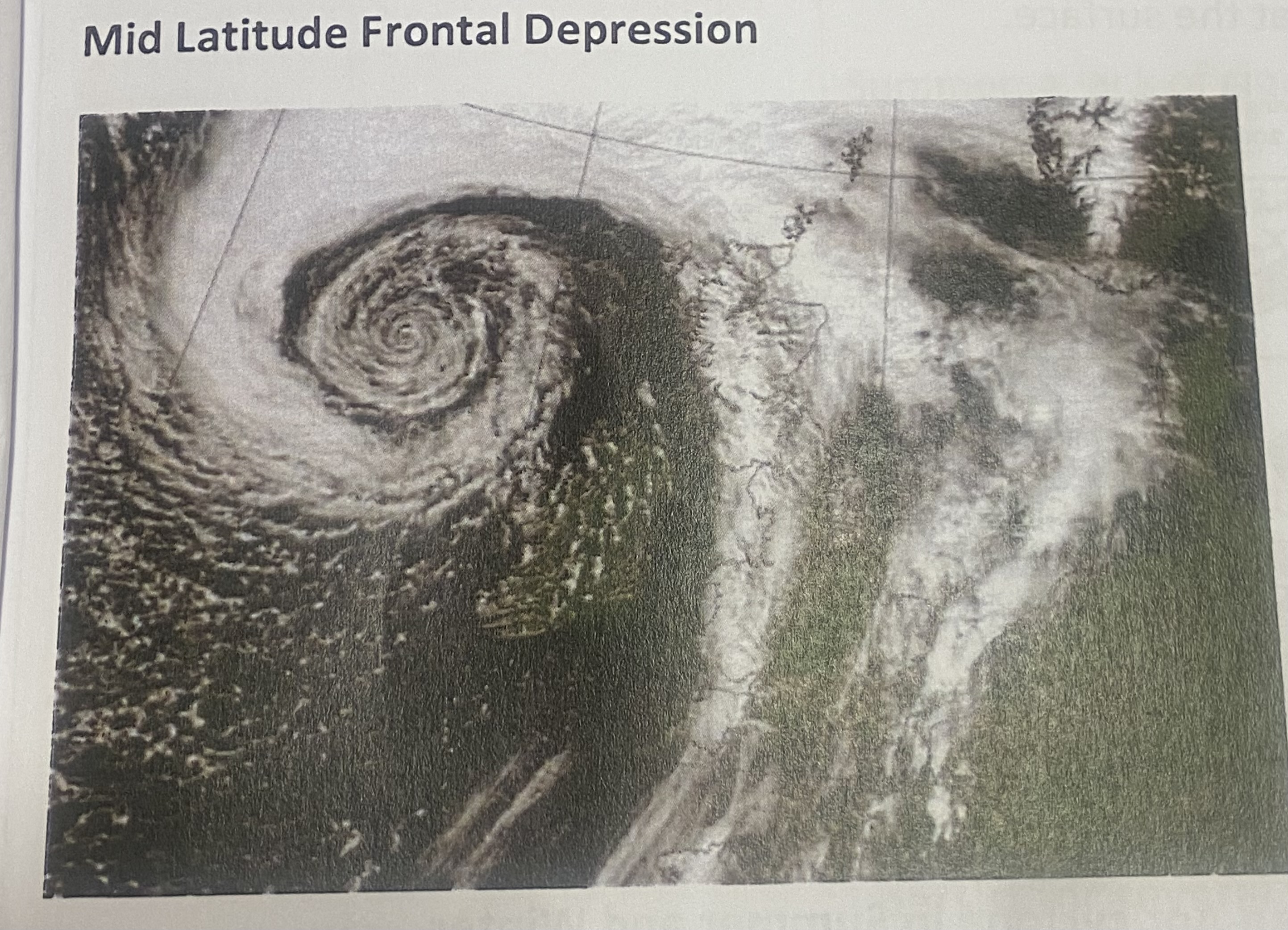 <p>White swirling band of cloud</p><p>Land and sea are not as visible</p>