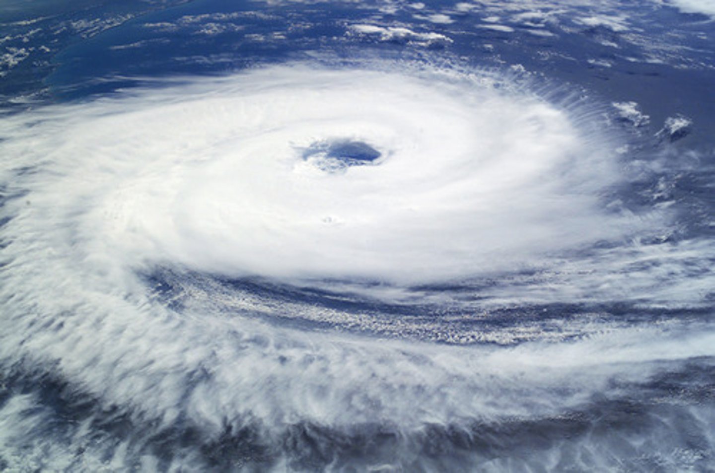 <p>The calm, low pressure center of a hurricane.</p>