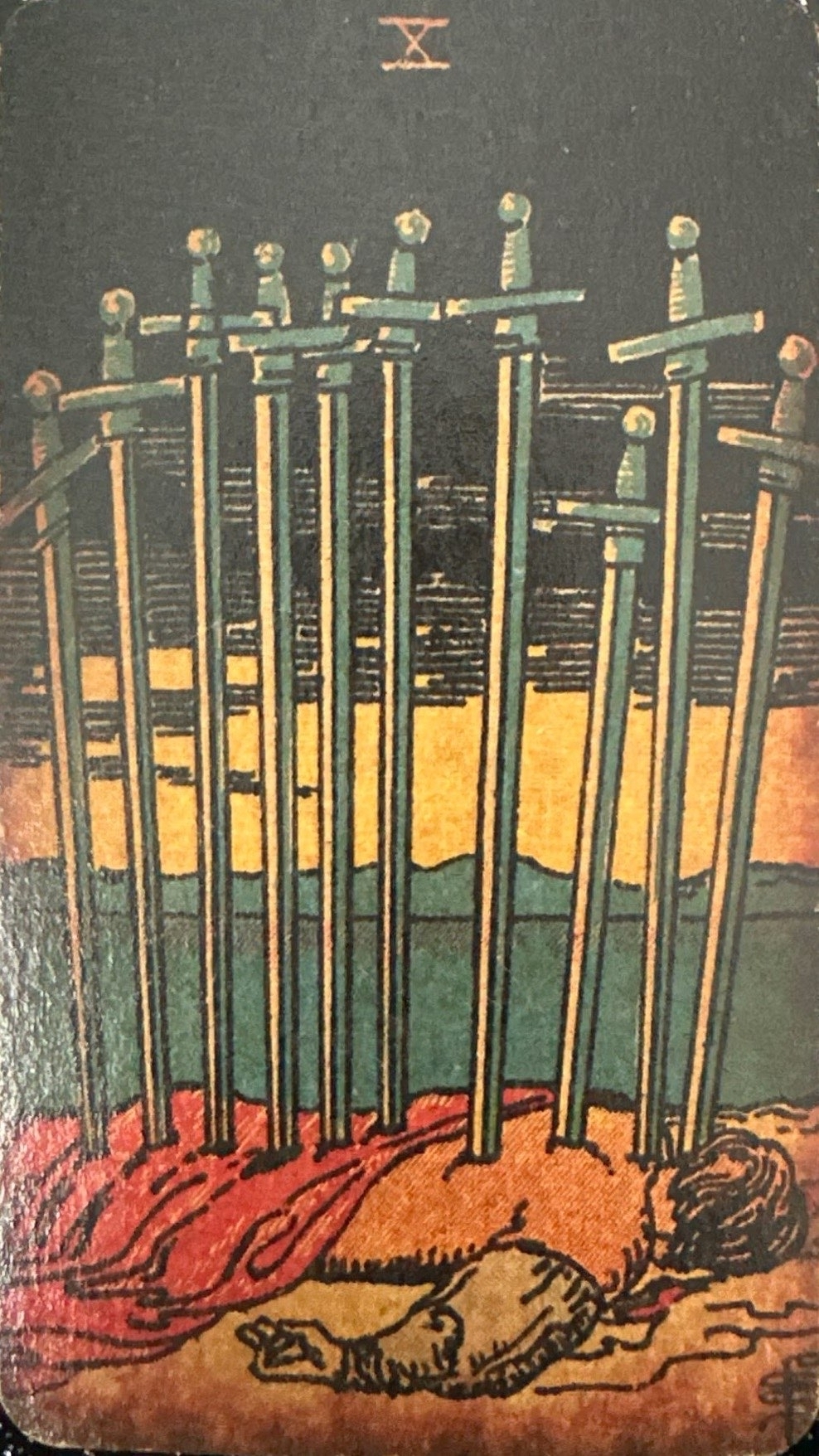 <p>X - Ten of Swords*</p>