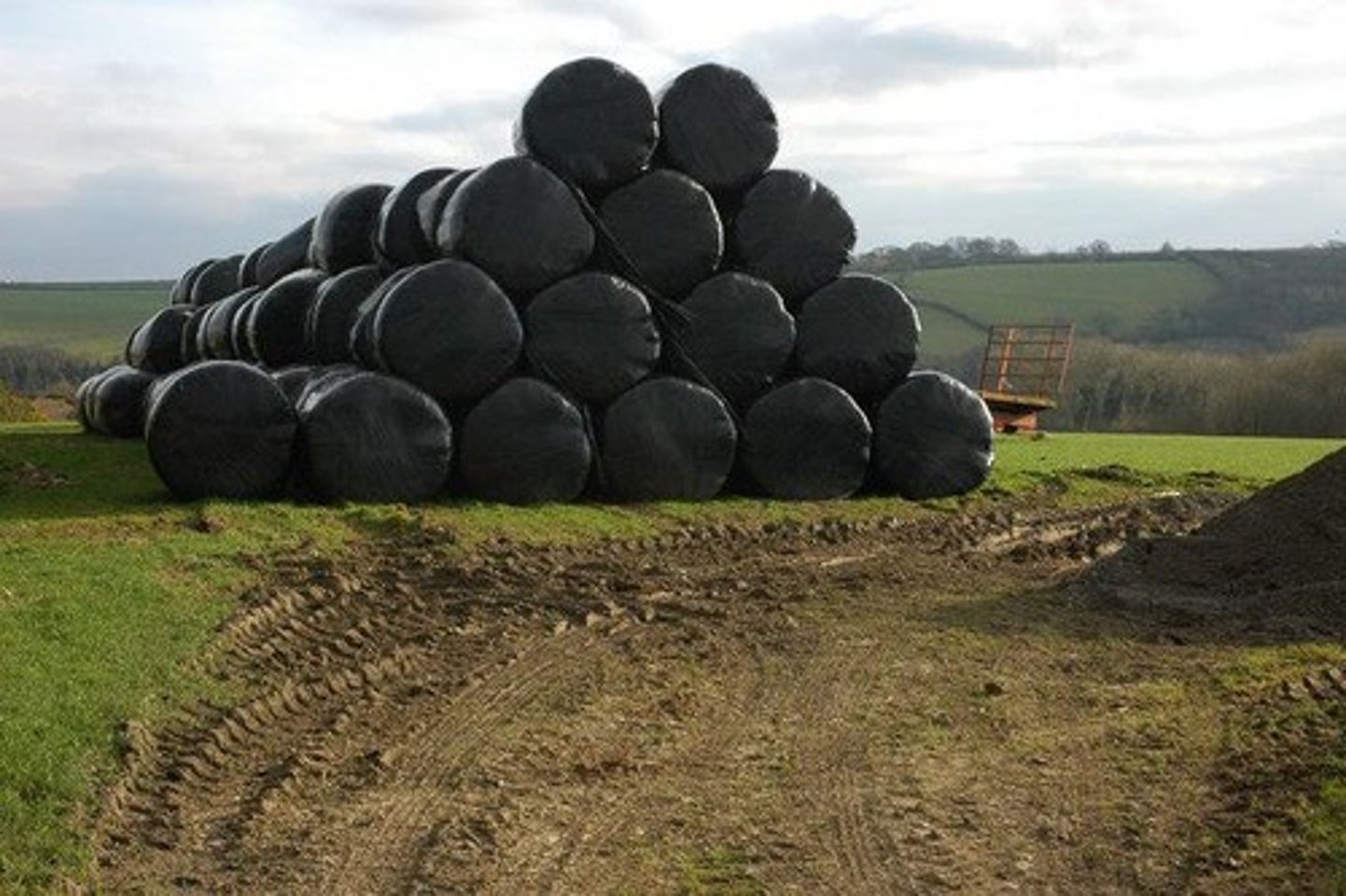 <p>Bales wrapped in plastic to prevent air exposure.</p>