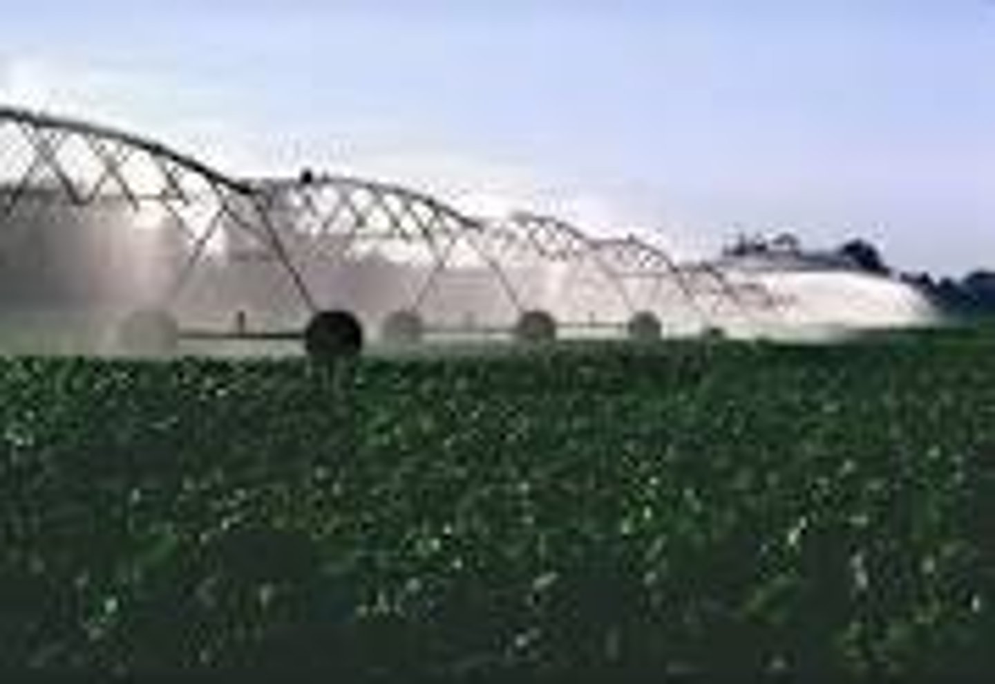 <p>A method of crop irrigation in which equipment rotates around a pivot and crops are watered with sprinklers</p>