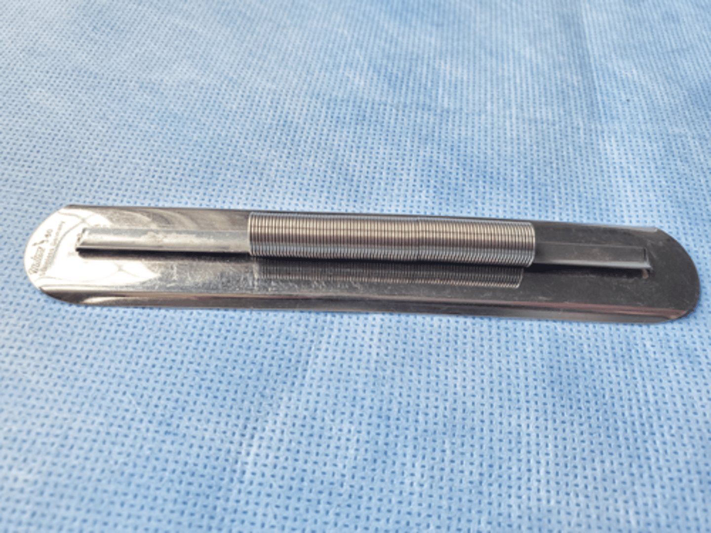 <p>needle rack with spring design which hold needles securely in position</p>