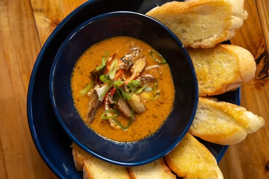 <p>S<span>autéed in a garlic butter sauce with green onions and toasted leidenheimer french bread</span></p>
