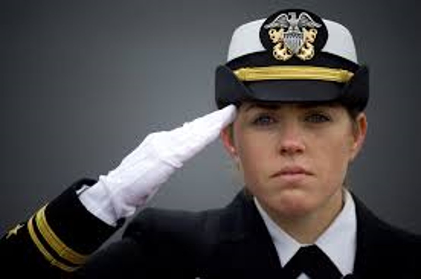 <p>a way to show respect, like bowing or raising your hand to your forehead.</p>