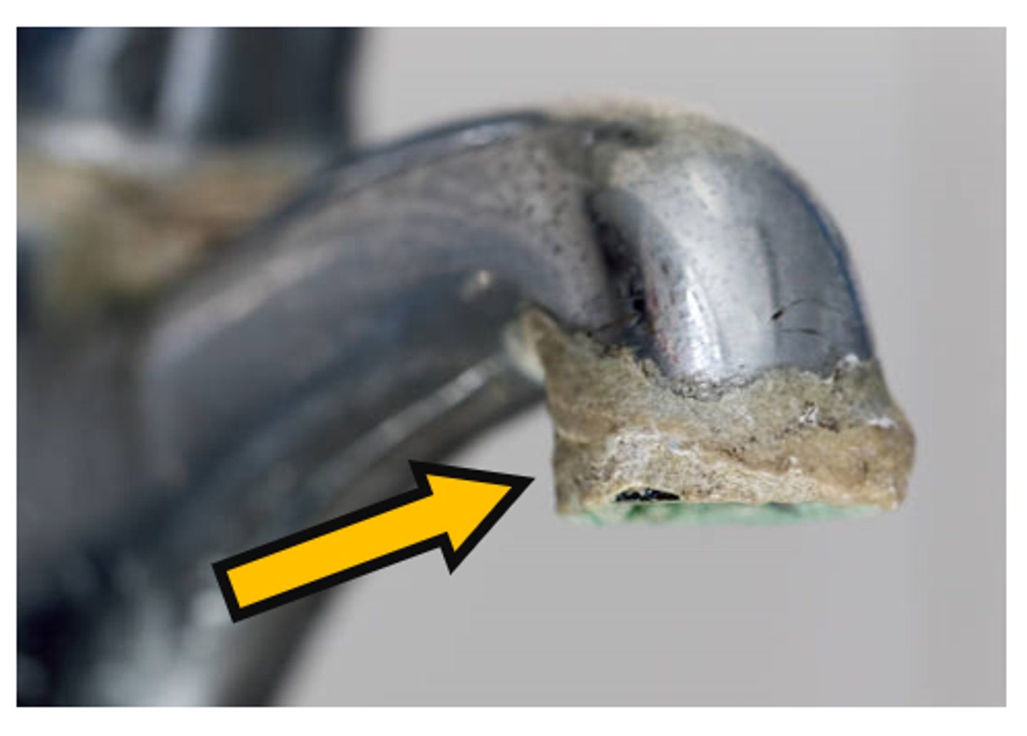 <p>a hard, white, chalky deposit that forms after water evaporates due to high levels of calcium &amp; magnesium in the water</p>