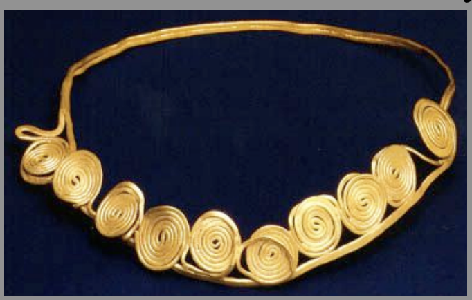 <p><strong><u>Date</u></strong> : 16th century BC </p><p></p><p><strong><u>Material</u></strong> : gold </p><p></p><p><strong><u>Significance</u></strong> : </p><ul><li><p>evidence of <strong>burial customs</strong> - <strong>gift</strong>/<strong>worn by the deceased</strong> as jewellery </p></li><li><p>evidence of <strong>wealth</strong> - <strong>gold jewellery</strong> </p></li><li><p><strong>craftsmanship</strong> - <strong>bending</strong> and <strong>twisting</strong> the <strong>gold</strong> to create those spirals </p></li></ul><p></p>