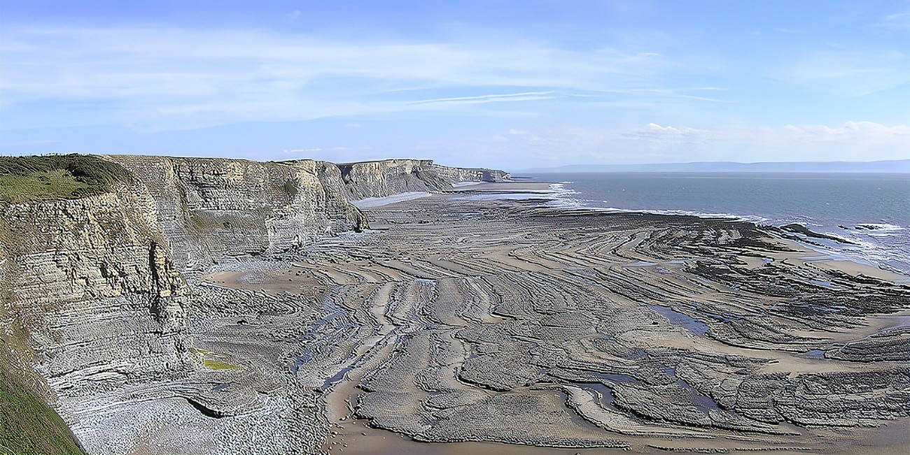 <p>over time, multiple collapsing events lead to the cliff retreating, leaving behind a wave-cut platform</p>