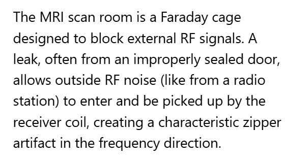 <p>A. A zipper artifact in the frequency direction</p>