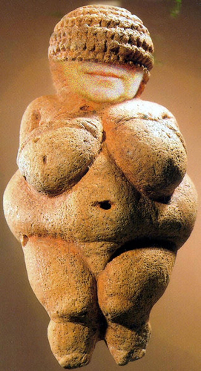 <p>Austrian painted venus made of limestone; stumpy female figure features pendulous breasts, an obese middle and belly, and pronounced buttocks</p>