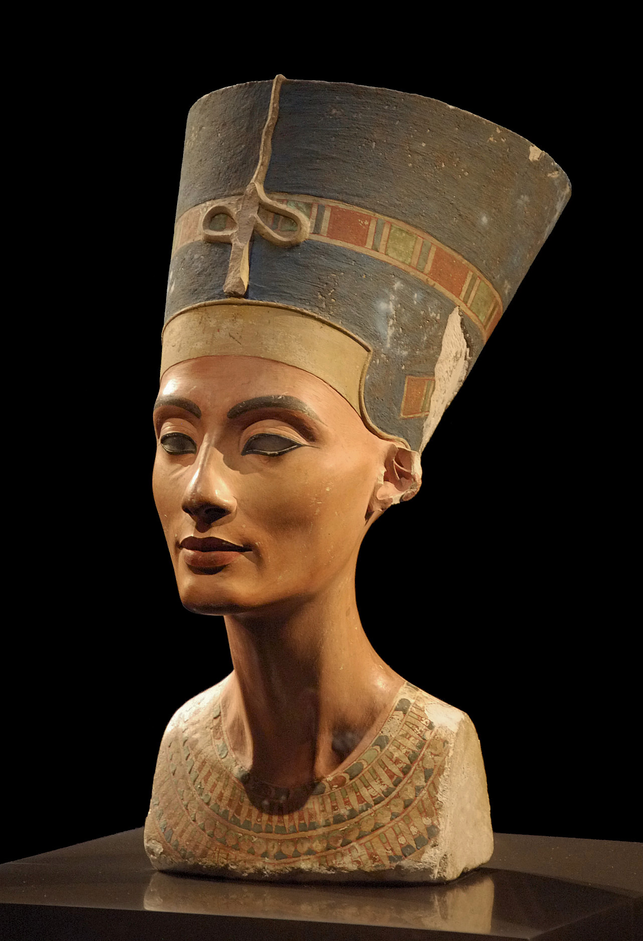 <p>(Egypt) New Kingdom:) Thutmose, Bust of Nefertiti: Made in-</p>