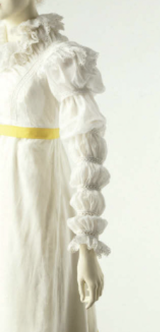 <p>full to the wrist, but tied in at intervals with ribbons or bands </p>