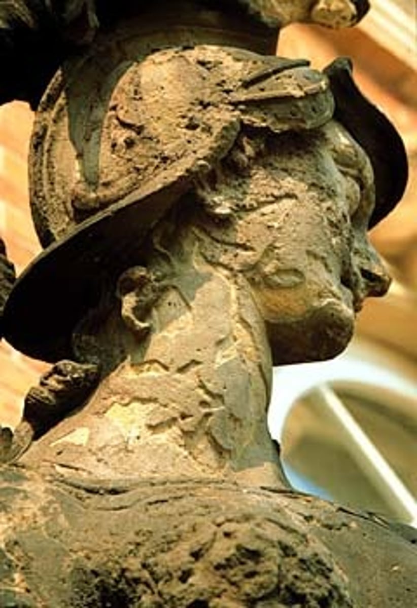 <p>Weathering due to acids from water or plants.</p>