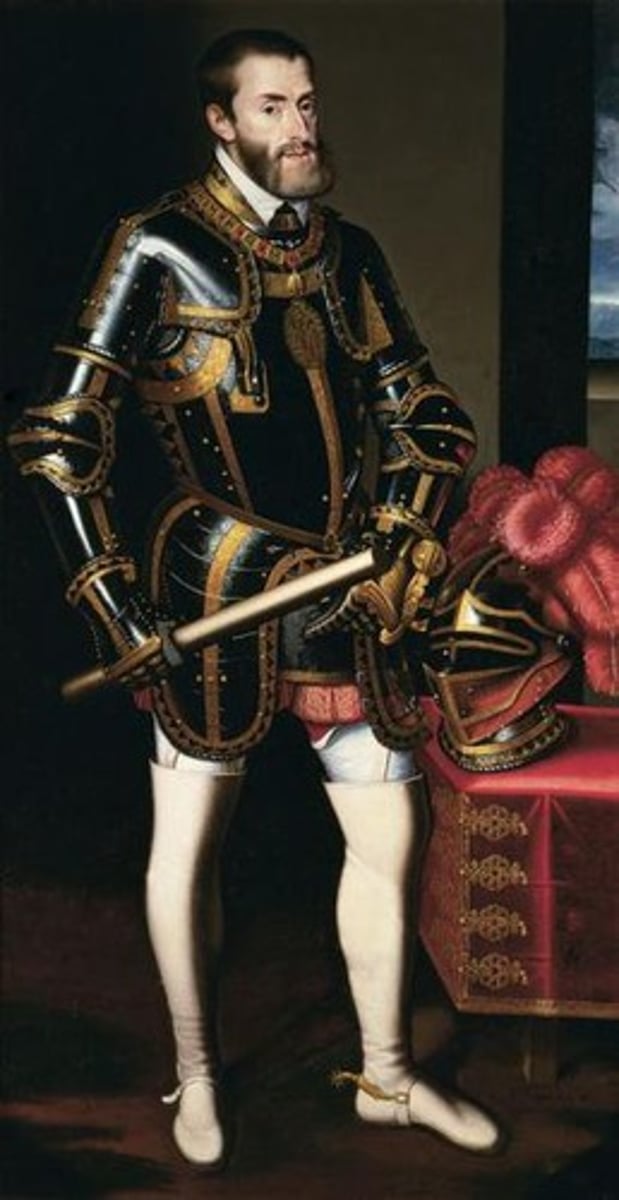 <p>a member of the Habsburg family, he ruled as the Holy Roman Emperor and King of Spain, and controlled the vast majority of Europe and the American colonies during his rule; he continued the idea of a consolidated monarchy, and his rule was defined by defending the HRE's Catholic lands against the rising Protestant Reformation; he signed the Peace of Augsburg in 1555 in an attempt to keep peace in the German lands</p>