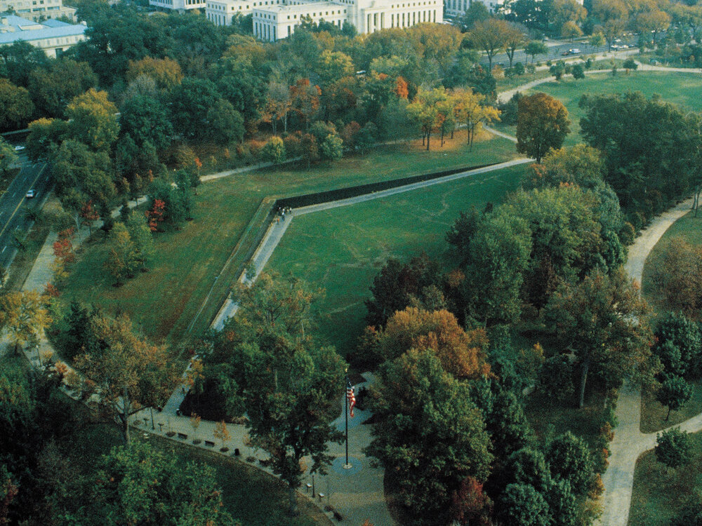 <ul><li><p>By Maya Lin (1982)</p></li><li><p>dedicated to the deceased and missing-in-action soldiers of the Vietnam War.</p></li><li><p>Black granite, a highly reflective surface</p></li></ul>