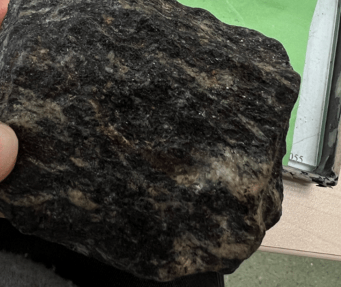 <p>forms from sedimentary rocks like shale, siltstone, sandstone<br>foliated, contains biotite</p>