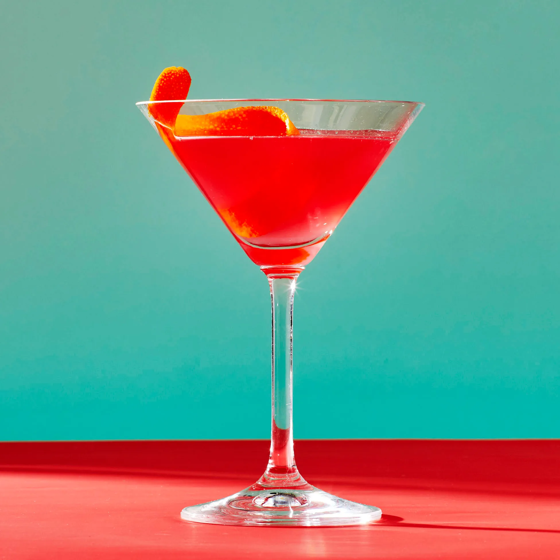 <p>sour, 1.5 oz vodka, 0.5 oz triple sec, 0.5 oz lime juice, 1 oz cranberry juice, 0.5 oz simple syrup, served straight up, garnished with lemon twist</p>