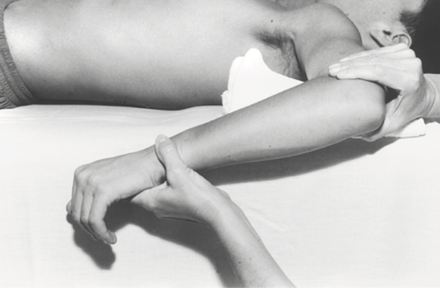 <p>Supine, arm ABD 90 and elbow flexed to 90, palm facing toward feed, may need towel under distal brachium to level</p>