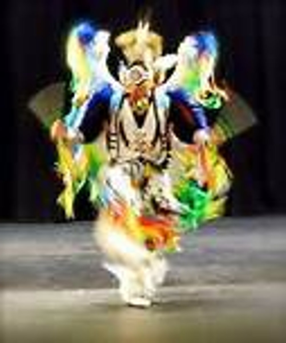 <p>a virtuosic dance (war (men perform) or even shawl (women perform) dance) performed by Native Americans</p>
