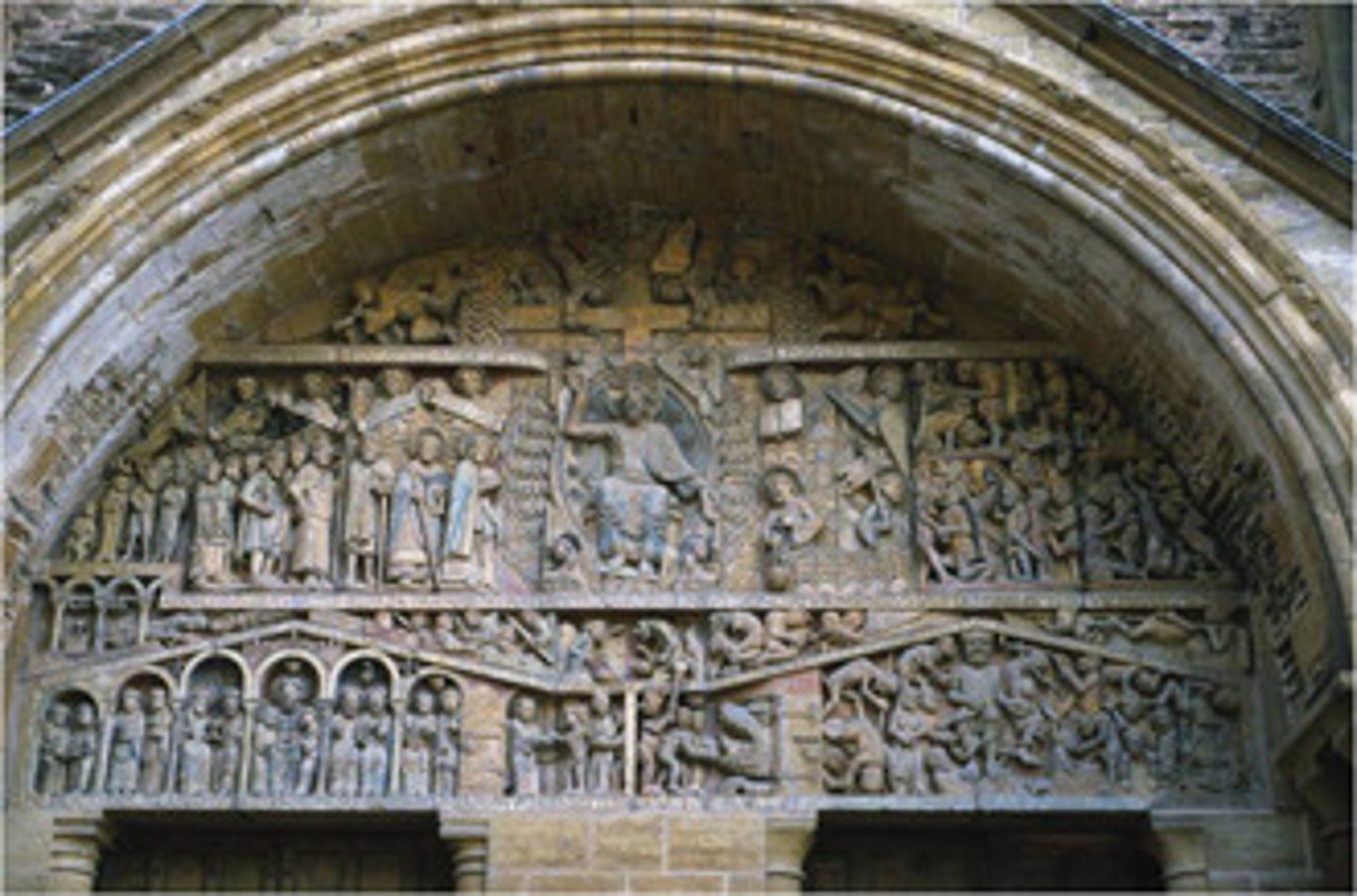<p>The Last Judgment tympanum: enthroned Jesus with Mary, Peter, and saints; right exit alludes to paradise while left entrance symbolizes hell.</p>