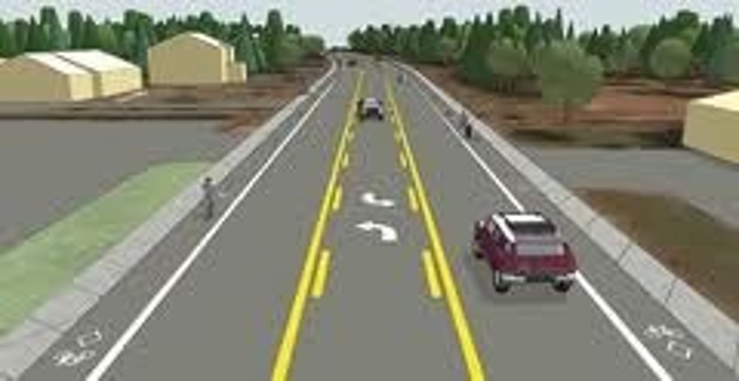 <p>The center lane in the illustration is used for:</p>
