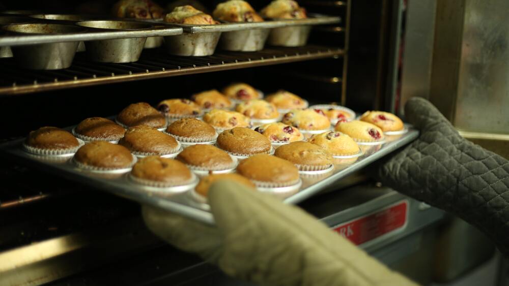 <p>Baking - Uses hot air circulating in an enclosed space(convection) to cook food evenly on all sides</p>