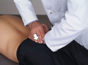 <ul><li><p>pt. prone, stand on opposite side of flexion</p></li><li><p>palpate flexed sacral sulcus → ABduct pt. same leg (loose SI joint) + IR</p></li><li><p>heel of caudad hand on ILA w/ cephalad on top → downward force</p></li><li><p>pt. inhale → resist, pt. exhale → follow (encourage extension) </p></li></ul><p></p>