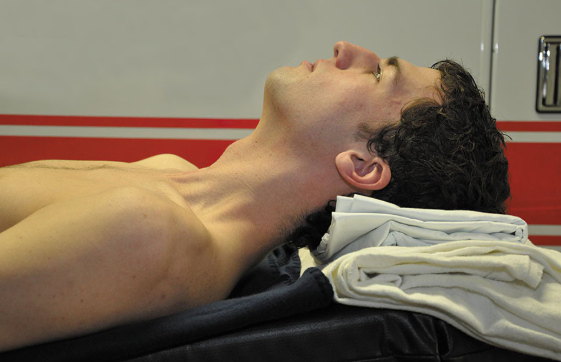 <p>the patient’s head is moved in an anterior fashion to replicate the posture a person would take if that person were smelling flowers or sniffing an odor. Optimal position is achieved when the patient’s ear is at the same level as the suprasternal notch.</p>