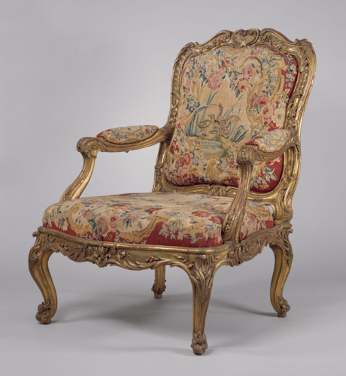 <p>French Baroque</p><p>upholstered chair with arms</p>