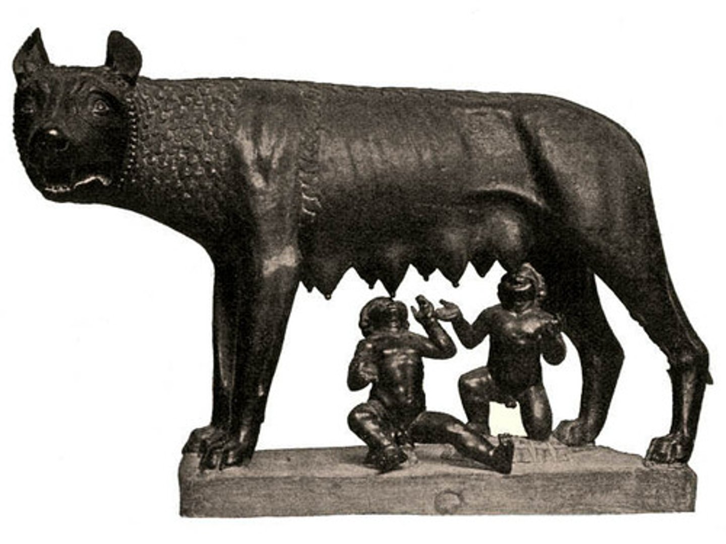 <p>(Ca 500-480 BCE) Roughly life-sized bronze Satue depicting Lupe the She-Wolf nursing Romulus and Remus. The original children in the piece were lost and melted down and replaced in the renaissance. Note just how stylized the wolf is.</p>