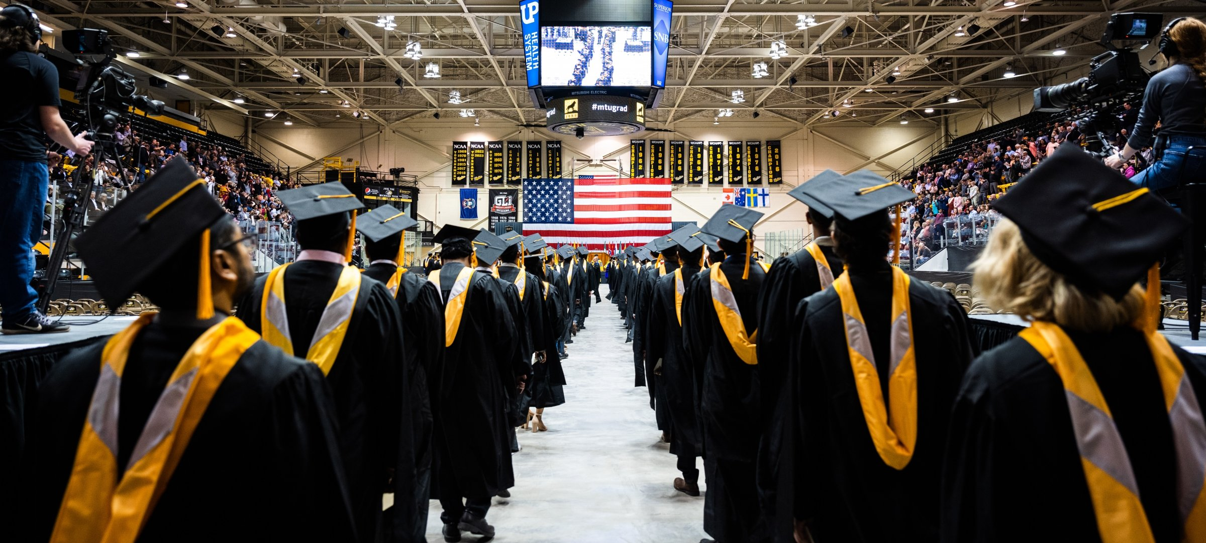 <p><em>At the _____ ____, everyone was hyped to finally get their diplomas, ready to dip out and glow up for real.</em></p>