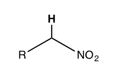 <p>NO2 on an alkane, the proton on the primary Carbon</p>