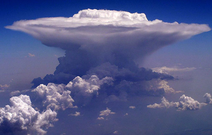 <p>mushroom/explosion look, spreads at top and can curl back under, associated with thunderstorms and severe weather </p>