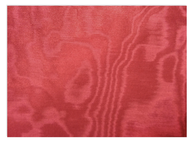 <p>Fabrics that have a wood grain or watermarked appearance.</p>