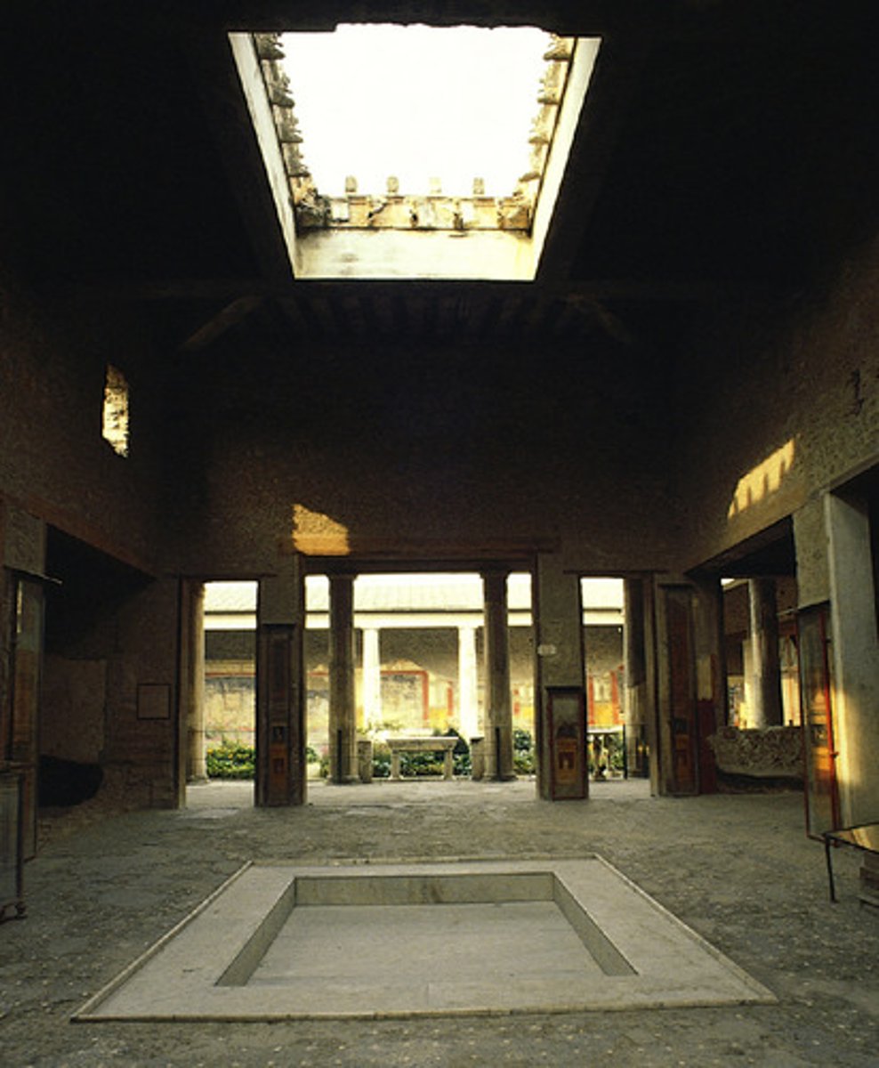 <p>Form:<br>-cut stone and fresco<br>-axial symmetry<br>Content:<br>-atrium (inner courtyard with pool)<br>-reception area (atrium) has open ceiling<br>-catch basin to collect rainwater<br>-peristyle garden in back of house<br>-living room with frescoes<br>-frescoes show person's taste and used as conversation pieces for businessmen to discuss<br>Function;<br>-represents the wealth of the people who lived there<br>Context:<br>-Pompeii, Italy<br>-Imperial Rome 2nd century BCE rebuilt 62-79 CE<br>-wealthy family's home set in the middle of markets</p>